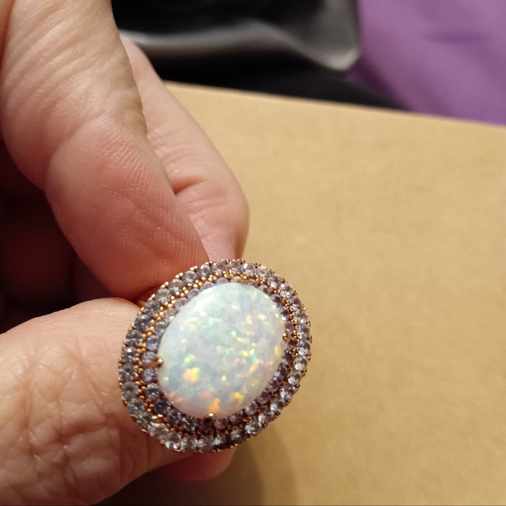 Women's size 9 rose gold ring, opal, aquamarine, clear stons
